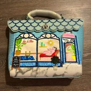 Blue Purse. Vendula london. Back pack.